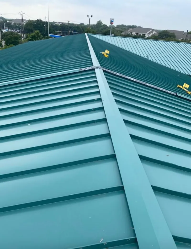 Green commercial metal roof ridge and valley for Metal Roof Repair in Racine