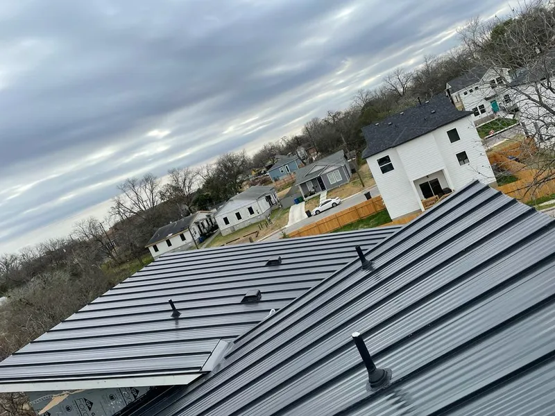 Standing seam metal roof panels with vents for Skylight Repair in Racine